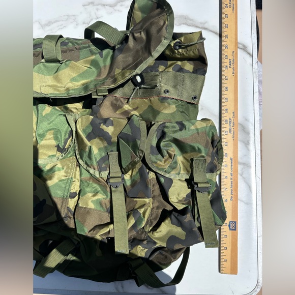 Other - Military Camouflage Rucksack. Multiple pockets, back pad, cinch top.